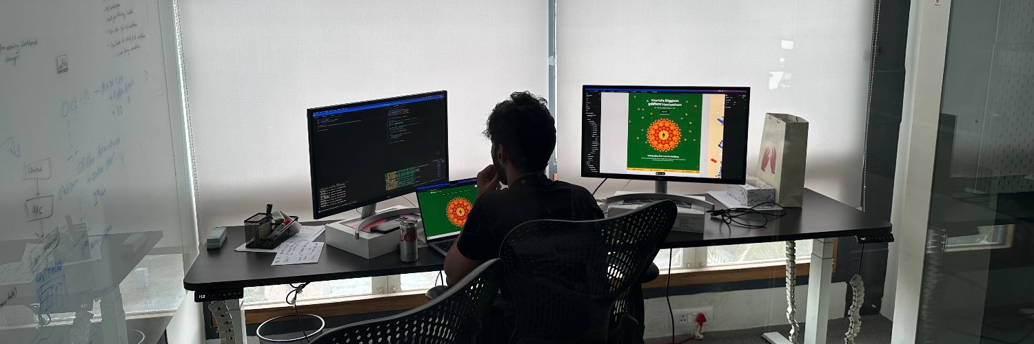 Pratham Vaidya working at his desk